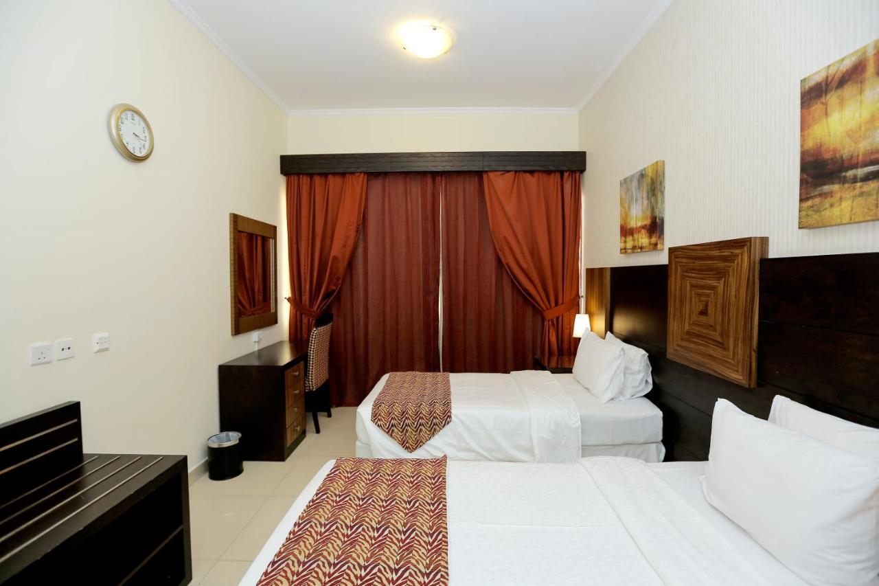 Ivory Grand Hotel Apartamentos Dubái Exterior foto
