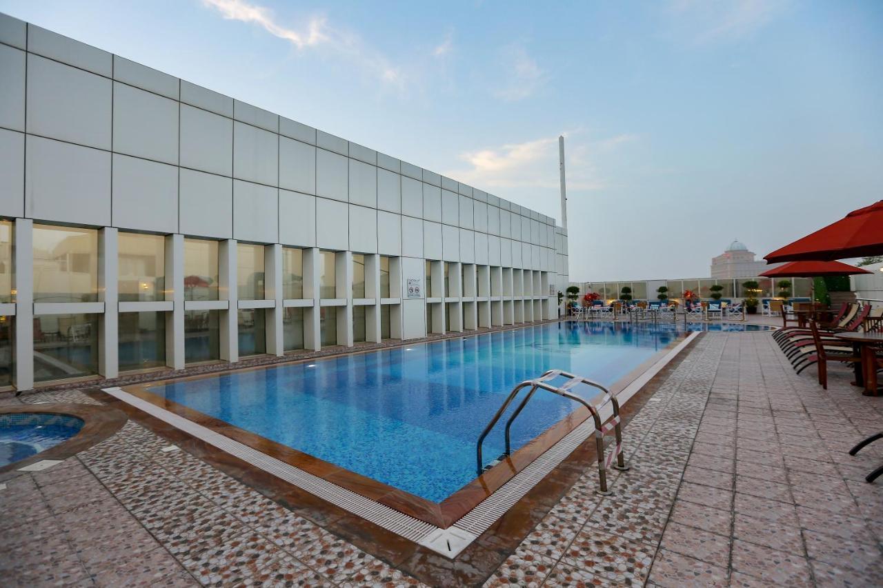 Ivory Grand Hotel Apartamentos Dubái Exterior foto