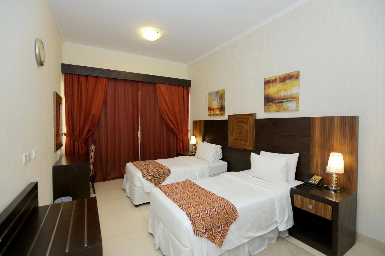 Ivory Grand Hotel Apartamentos Dubái Exterior foto