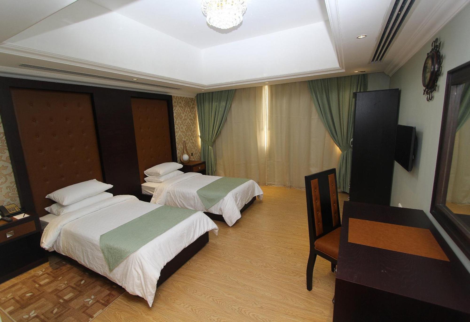 Ivory Grand Hotel Apartamentos Dubái Habitación foto
