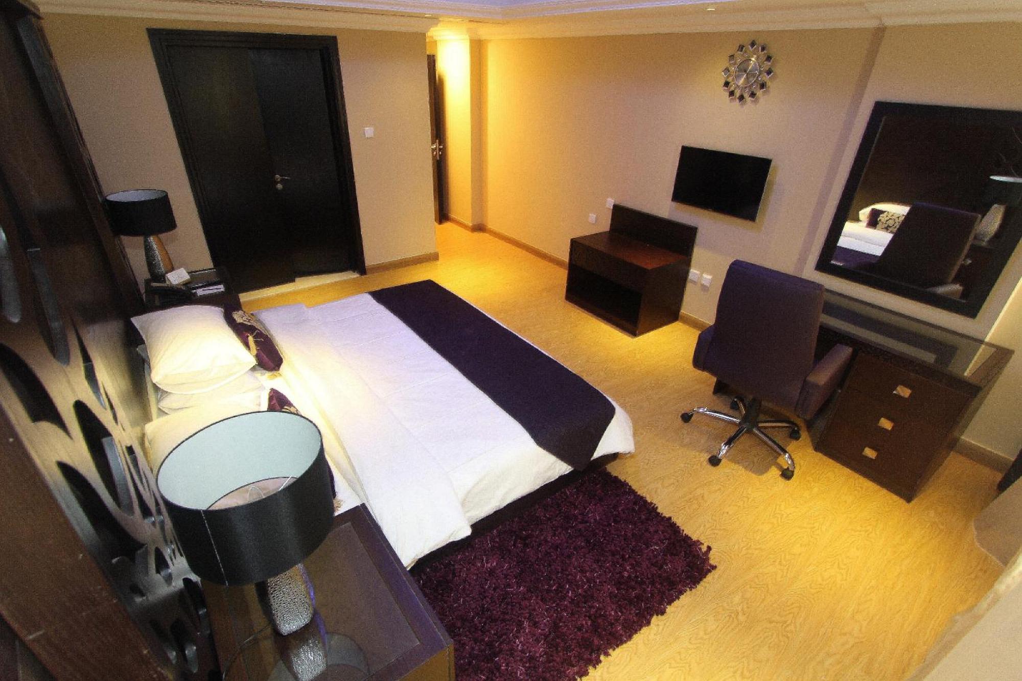 Ivory Grand Hotel Apartamentos Dubái Habitación foto