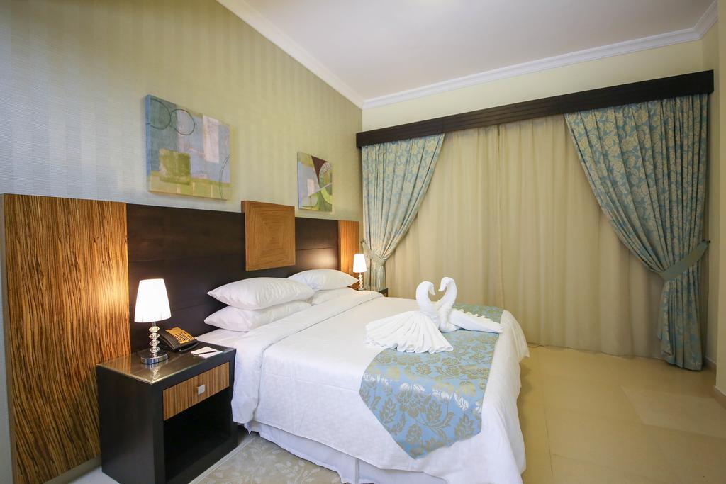 Ivory Grand Hotel Apartamentos Dubái Exterior foto